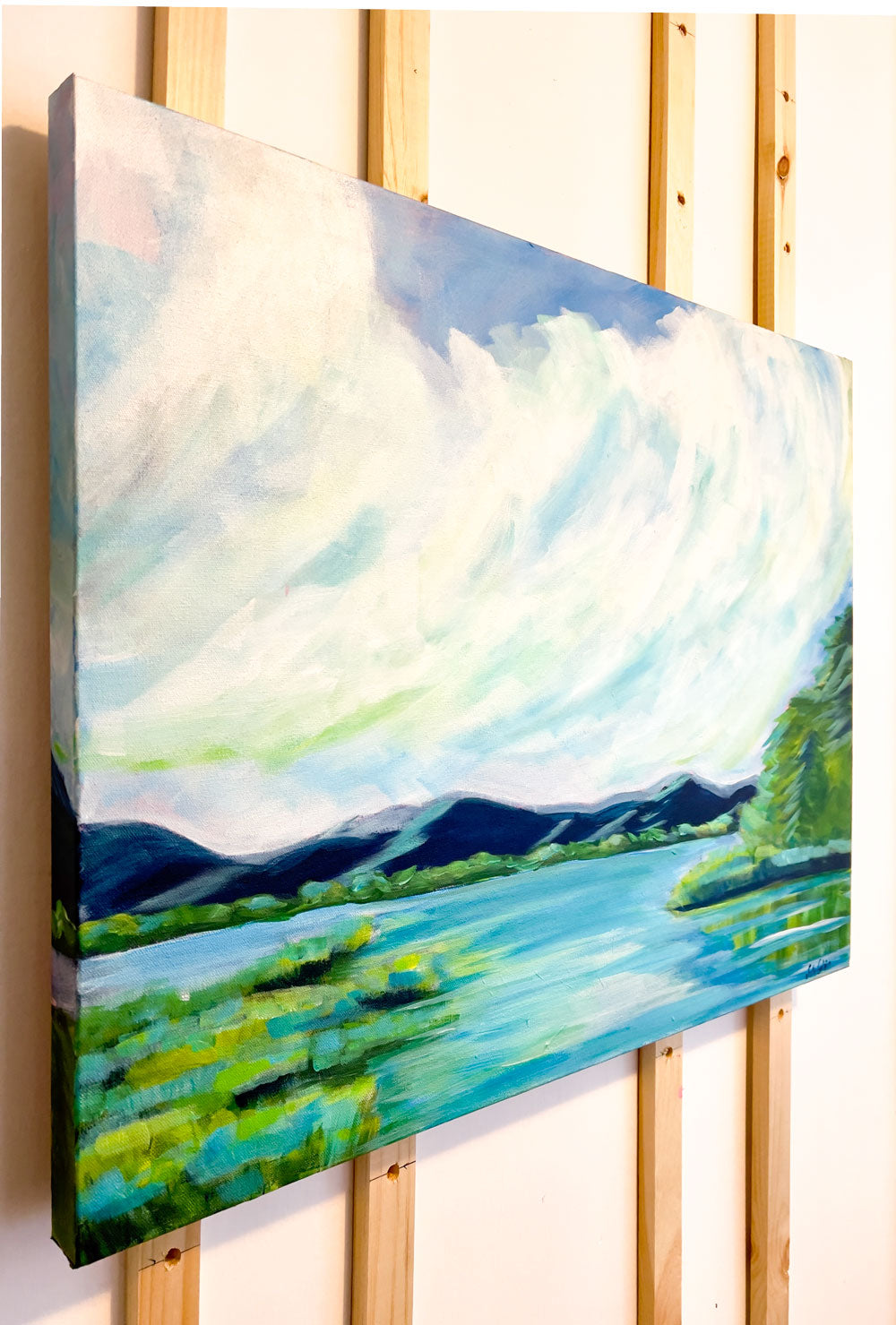 30" x 24"
Acrylic on Gallery Wrapped Canvas
Experience an ever-changing canvas with Perspectives.
Inspired by the tranquil views of the Blue Ridge Mountains, our large painting captures the serene blues and greens of the lake, accented by billowing white clouds and lush marsh grasses.
Take a journey through the woods without leaving your home with this unique piece."