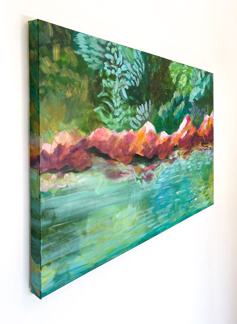 36" x 24"
Acrylic on Gallery Wrapped Canvas
Sit back, relax, and enjoy the good life with Joy! Prepare to be enchanted as you take in the mesmerizing Leesville Lake and its shore, with its emerald green water and turquoise lapping waves. And don't forget the majestic pink rocks that glow in the sun! Joy also takes you deep into the cool woods where the impressionists found their inspiration. So come find your Joy! (It's just that simple!)
