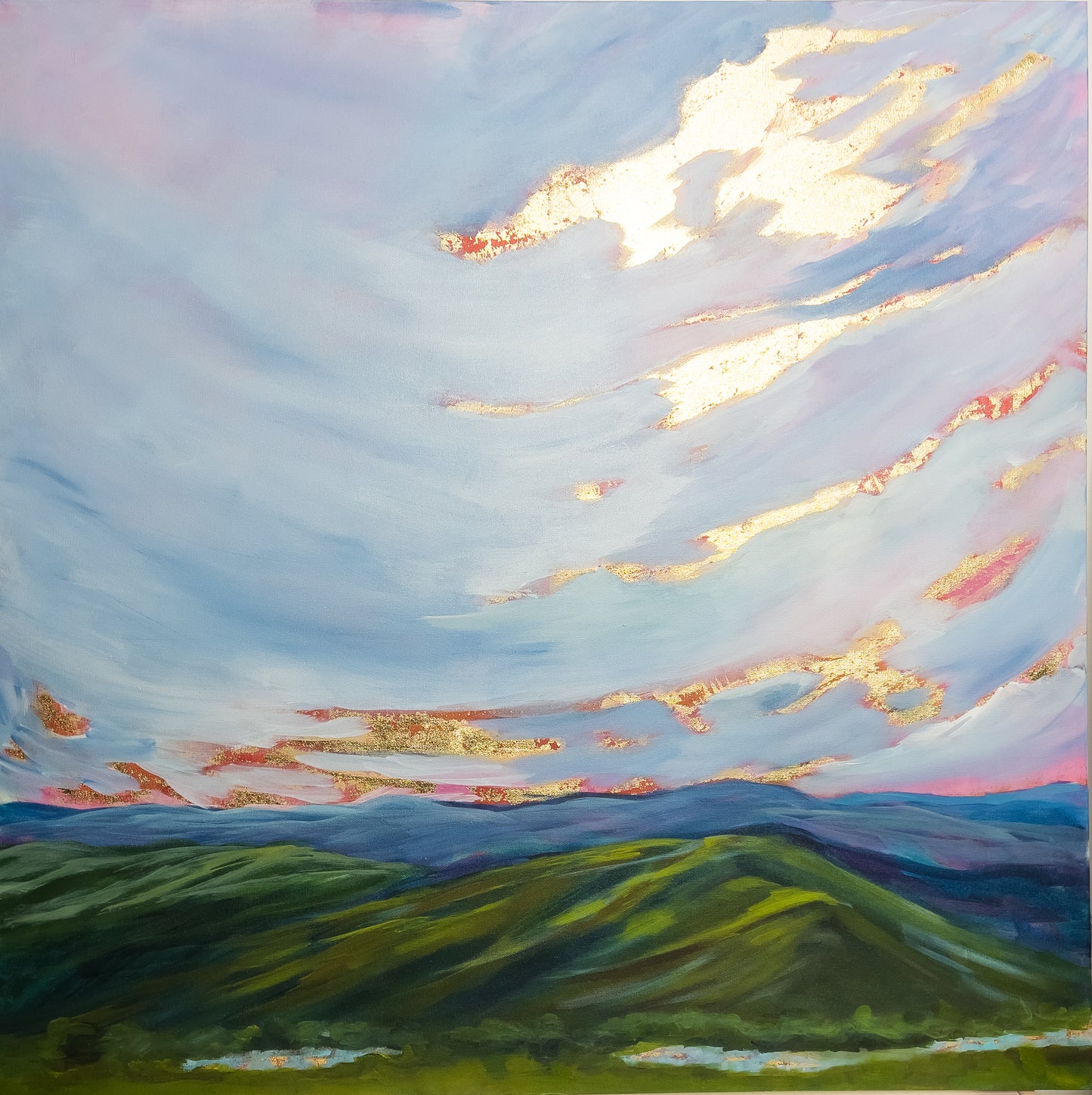 36" x 36"
Acrylic and gold leaf on canvas
Add a touch of whimsy to your wall with our Blue Ridge Parkway canvas painting.
Featuring an impressionistic style, this extra large piece captures the stunning blue sky and sunrise with delicate gold leaf accents that symbolize the regal and sacred aspects of nature.
Perfect for any nature lover or art enthusiast!