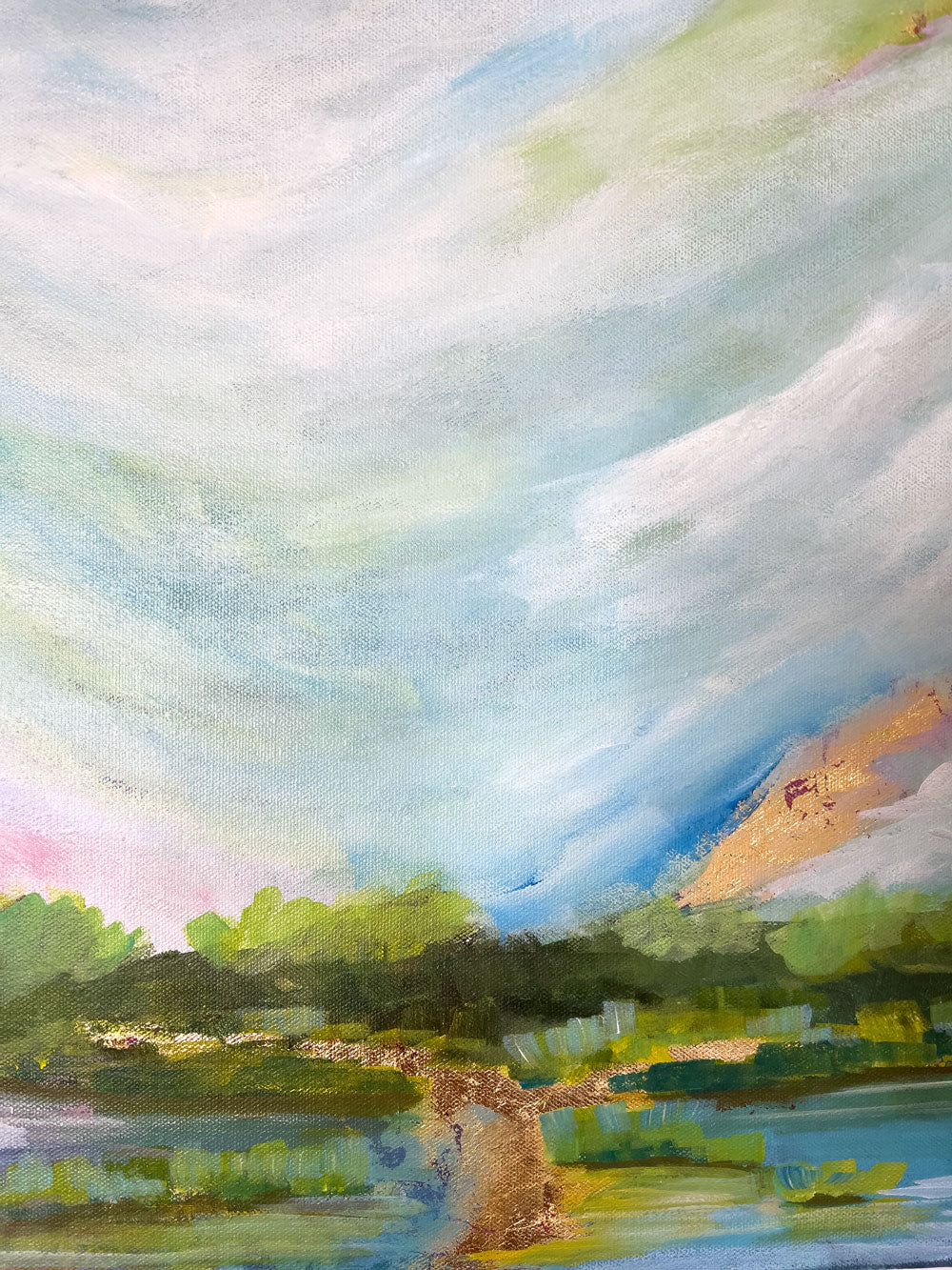 4" x 18"
Acrylic and Gold Leaf on Gallery Wrapped Canvas
An original abstract landscape by Sally J Goodrich
Blue, pink and gold represent the sun rising over the blue ridge mountains and lake. the gold is relected in the lake which is bound by native trees and grasses.