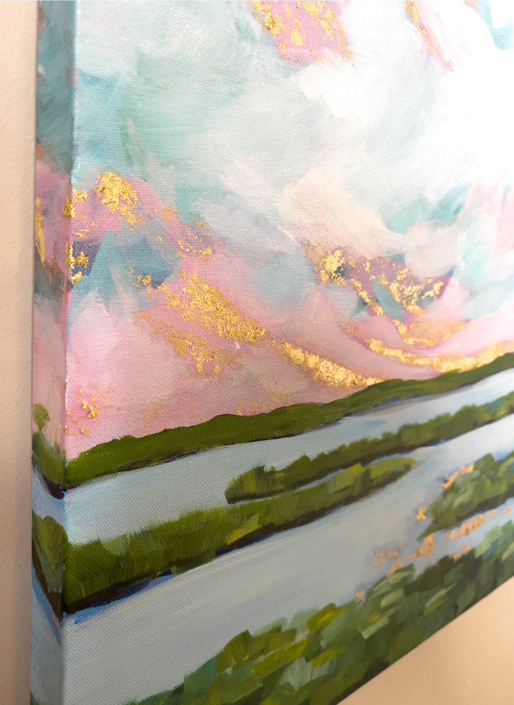 24" x 36"
Gallery wrapped canvas
Acrylic paint and gold leaf
Experience the beauty of the eastern coastline with Coastal V.
This unique piece features stunning scenes from the Downeaster train, showcasing Maine's landscape, marsh grasses, and coastline.
With blue, pink, and white skies and a gold leaf sunrise, this modern landscape is a true impressionistic masterpiece.