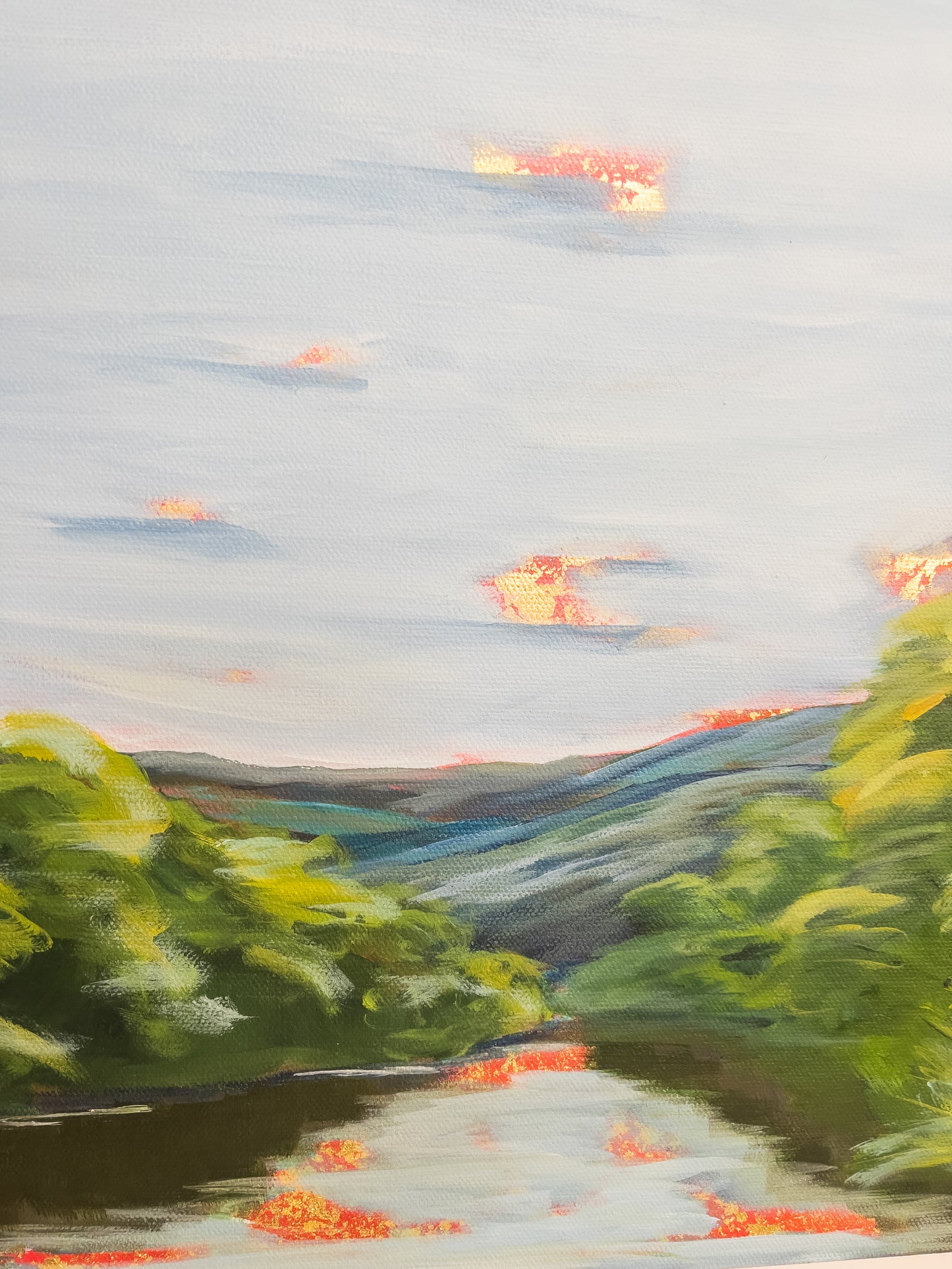 20" x 24"
Experience the breathtaking beauty of the Roanoke River with this stunning painting on canvas.
The vivid blue water is surrounded by lush green trees and shrubs, with the majestic Blue Ridge Mountains in the distance.
The vibrant blue sky is only enhanced by the golden rays of the sunrise, captured in delicate brush strokes of shimmering gold leaf.
This unique mix of impressionism and regal elements truly captures the sacred essence of nature.
Don't miss the opportunity to own this large and