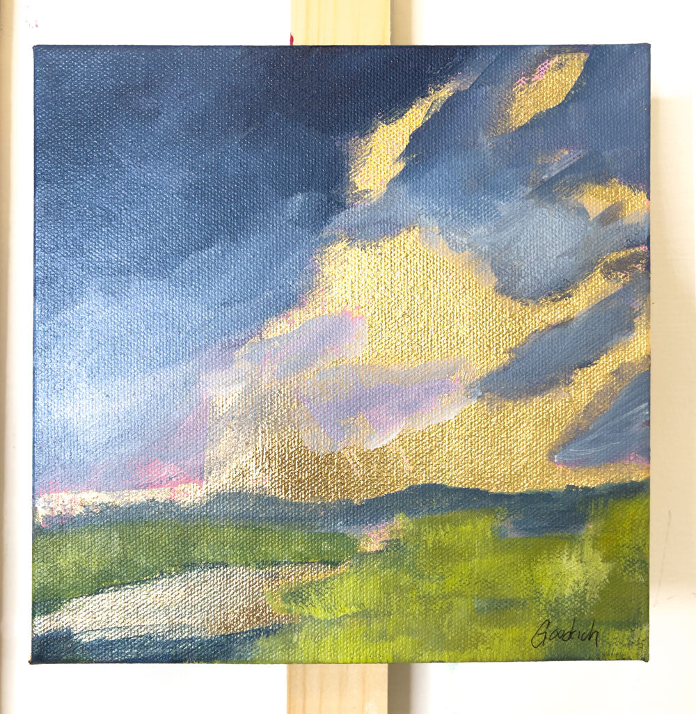 8" x 8"
Gallery wrapped canvas
Acrylic paint and gold leaf
Impressive: Capture the mood of spring with moody clouds, April showers, and a golden sunrise.
Let the gray-blue clouds and reflections of gold in the stream transport you to the lush blue ridge mountains, surrounded by vibrant yellow-green marsh grasses.