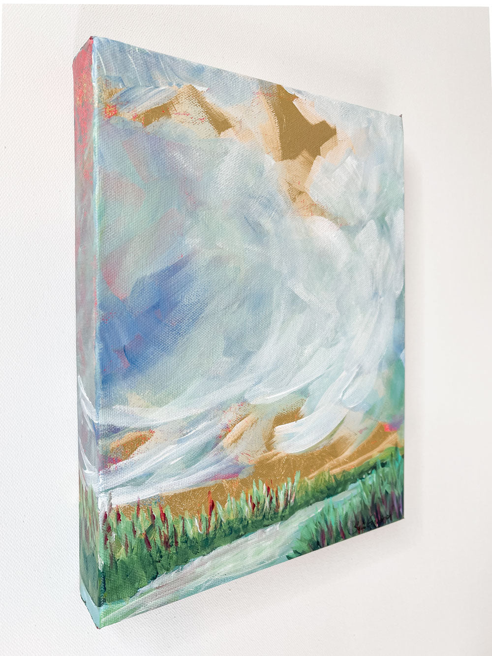 9" x 12" x1.5"
Gallery wrapped canvas
Acrylic paint and gold leaf
Step into a world of serenity with "Magnificent Obsession"!
This small painting combines the beauty of cloudscapes with blues, gold leaf, a stream, grasses, greens, whites, and turquoises, making it a joy to behold.
Plus, its mixed media elements are sure to take you to another place - no passport required! 