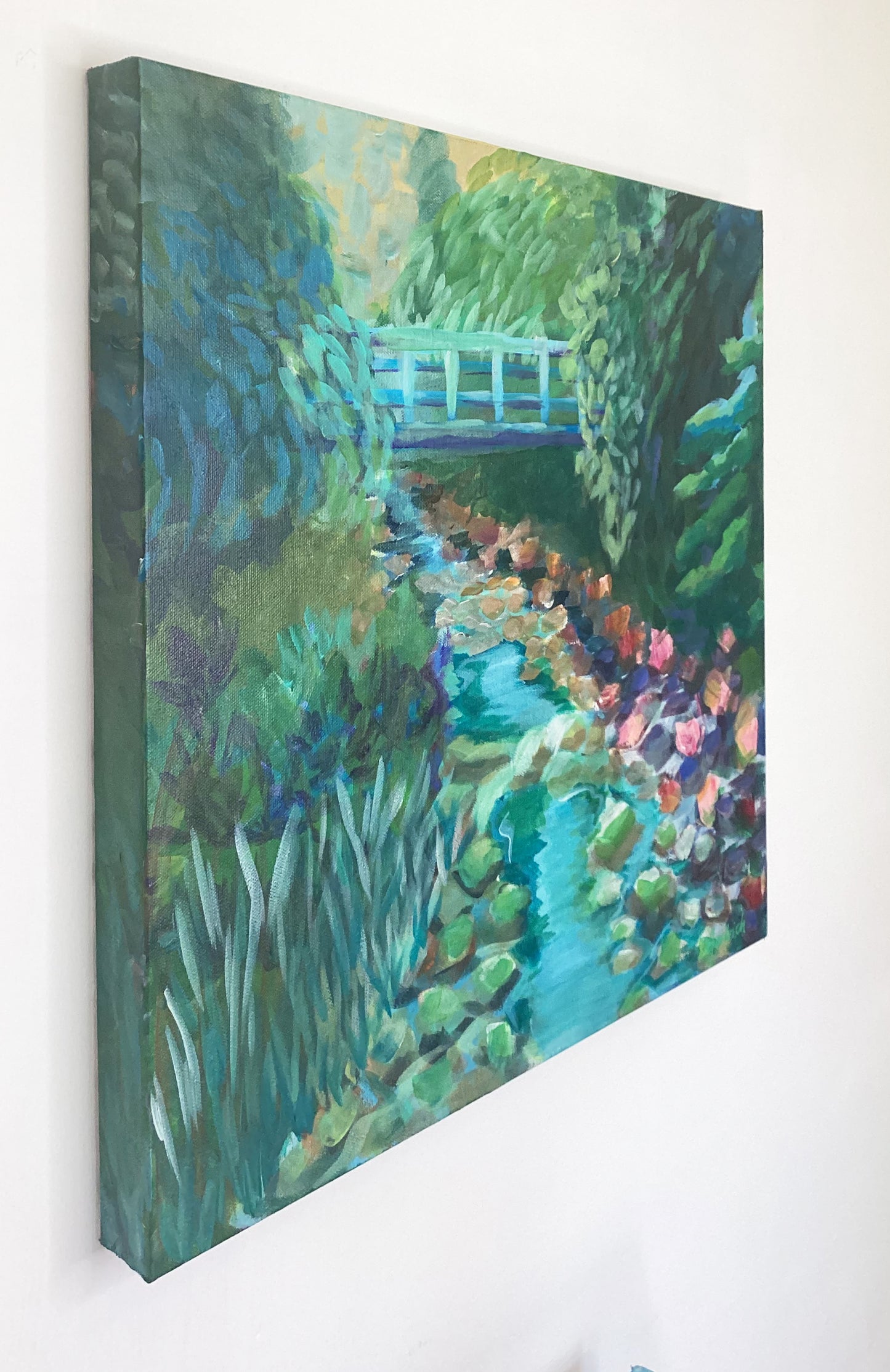 20" x 20"
gallery wrapped canvas
Embark on a journey to a tranquil retreat – with our Outdoor Escape painting!
Let your eyes be mesmerized by the lush green trees, the blue fresh mountain water, and the rocks worn and softened by time.
Plus, take a special trip to the little bridge tucked into the Blue Ridge Mountains just off Shanks Street in Salem, VA.
Come soak up the peace and beauty of nature!