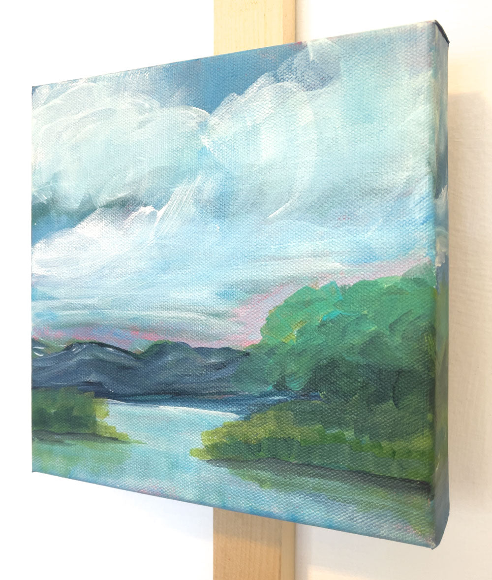 8" x 8"
Acrylic on Gallery Wrapped Canvas
Explore the "outer reaches" with this modern impressionistic landscape painting.
Admire the blue ridge mountains, serene lake view, and lush grove of trees.
Southern charm and a touch of whimsy await in this unique piece, featuring picturesque lake shore grasses and a tranquil marsh.