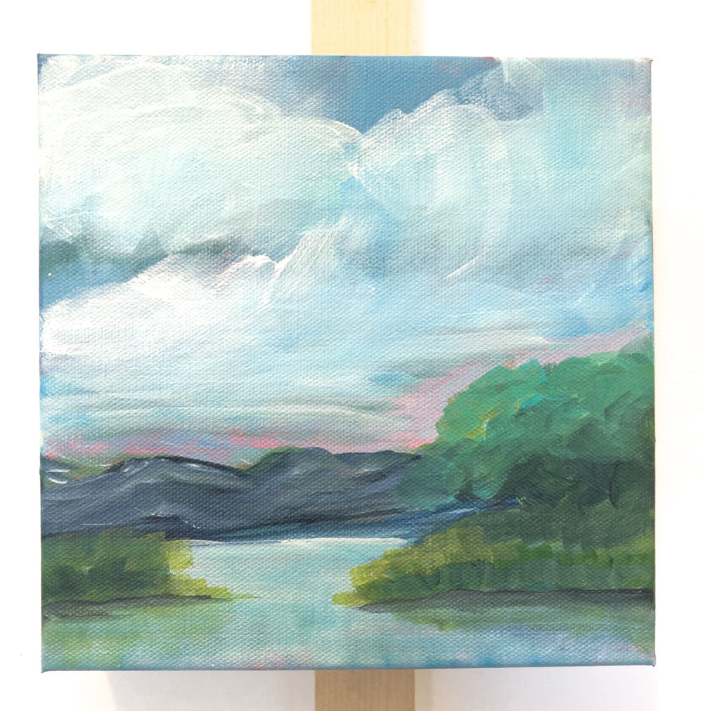 8" x 8"
Acrylic on Gallery Wrapped Canvas
Explore the "outer reaches" with this modern impressionistic landscape painting.
Admire the blue ridge mountains, serene lake view, and lush grove of trees.
Southern charm and a touch of whimsy await in this unique piece, featuring picturesque lake shore grasses and a tranquil marsh.