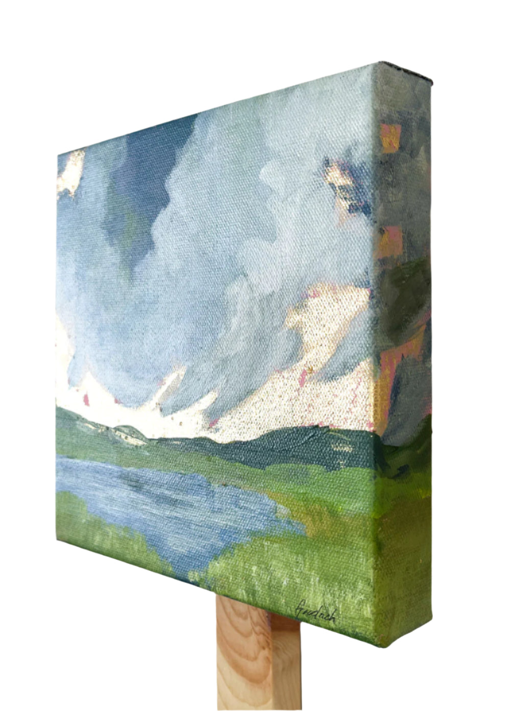 side view of gold leaf landscape with dramatic rising sun over a Blue Ridge mountains lake