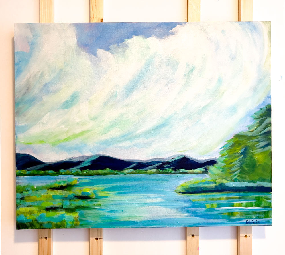 30" x 24"
Acrylic on Gallery Wrapped Canvas
Experience an ever-changing canvas with Perspectives.
Inspired by the tranquil views of the Blue Ridge Mountains, our large painting captures the serene blues and greens of the lake, accented by billowing white clouds and lush marsh grasses.
Take a journey through the woods without leaving your home with this unique piece."