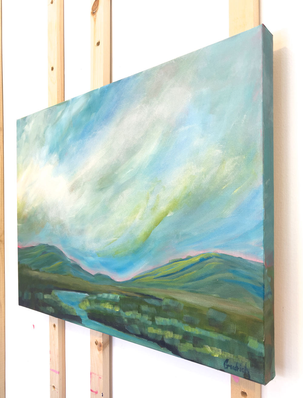 24" x 18"
acrylic on gallery wrapped canvas
Get lost in the serene beauty of this "Reading Room" with a dramatic acrylic painting of the Blue Ridge Mountains and a gentle blue stream.
The cool tones of blues, greens, and turquoises are complemented by a vibrant pink sunrise and waving grasses.
Perfect for a large room, this piece will bring a peaceful and tranquil atmosphere to your space.
