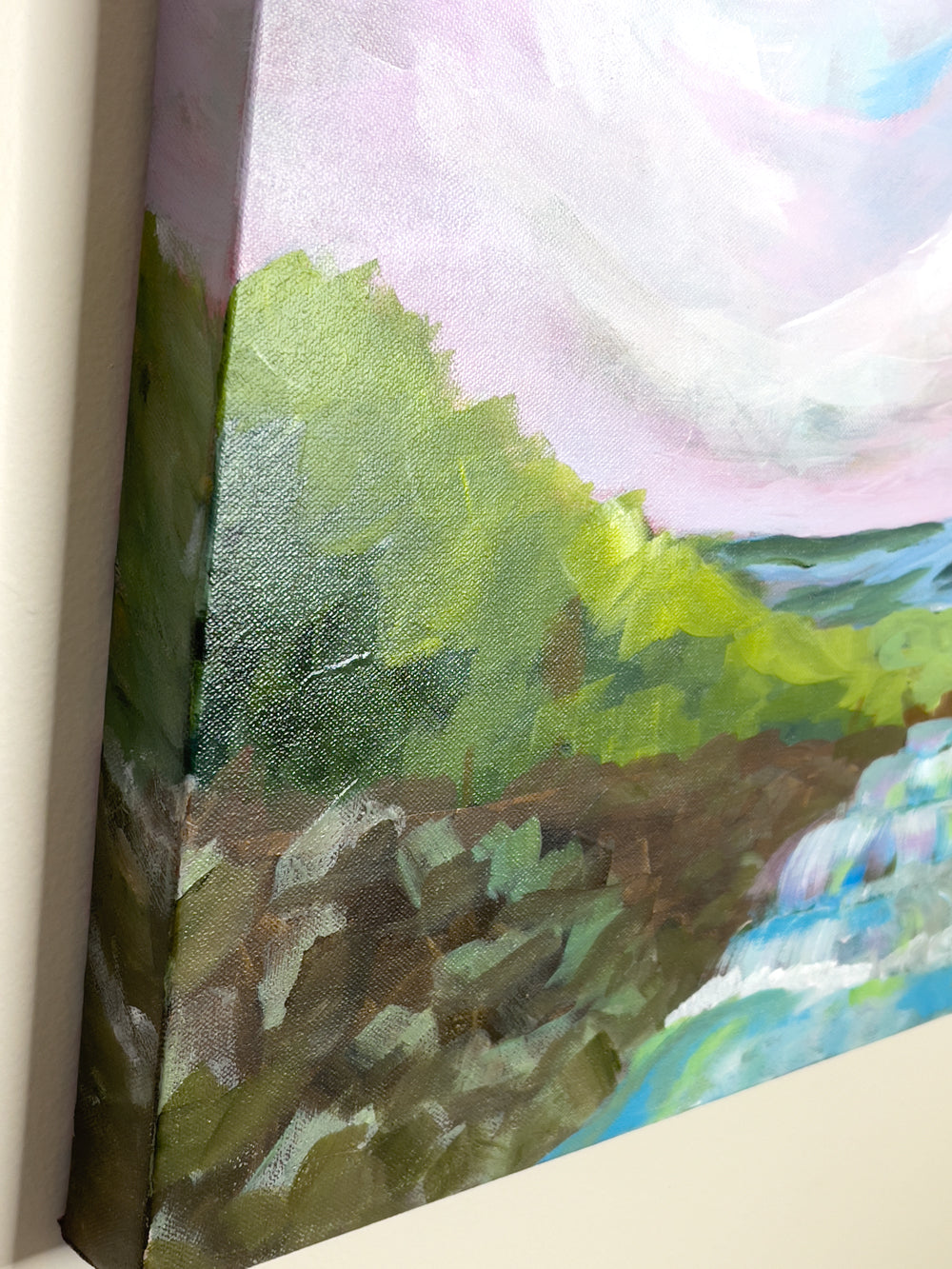 24" x 18"
Gallery wrapped canvas
Acrylic paint
Experience the beauty of the Blue Ridge Mountains with Waterfalls VI.
This stunning piece features pink and blue skies over dramatic waterfalls, surrounded by cool forests.
The impressionistic style captures the splashing water as it tumbles down rocky ledges.
Bring the outdoors inside with the blue waters and green forests.