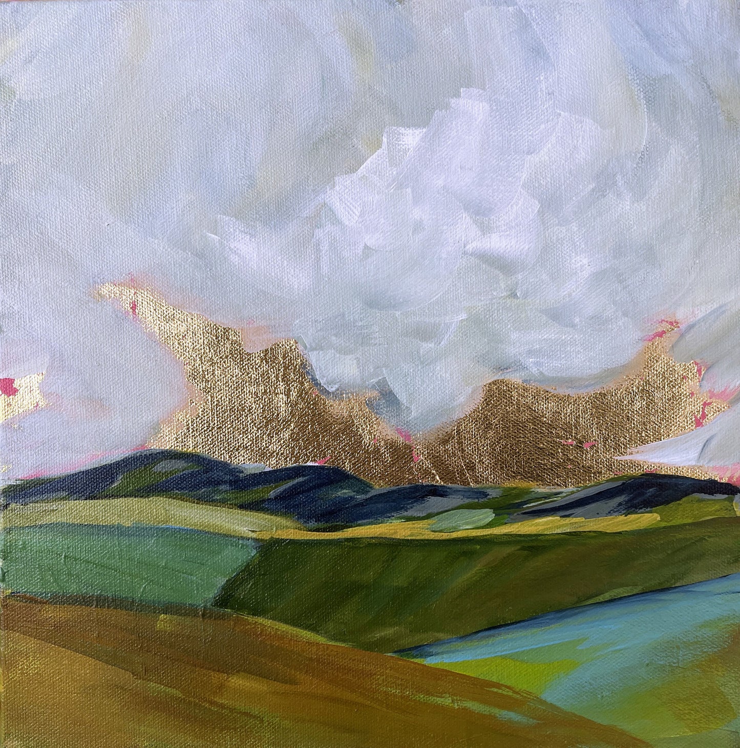 Abstract landscape painting with gold mountains and blue sky