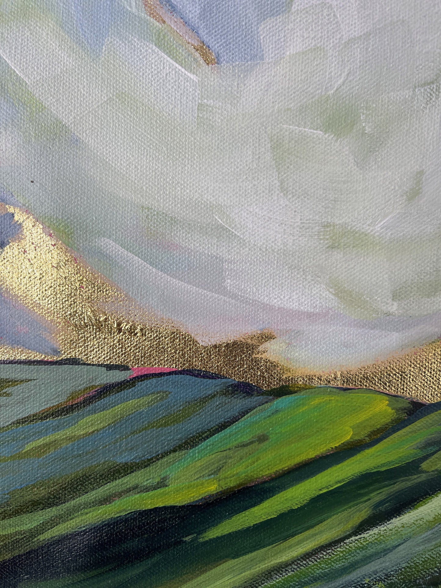 Artistic depiction of a landscape with green fields and gold mountains under a blue sky.