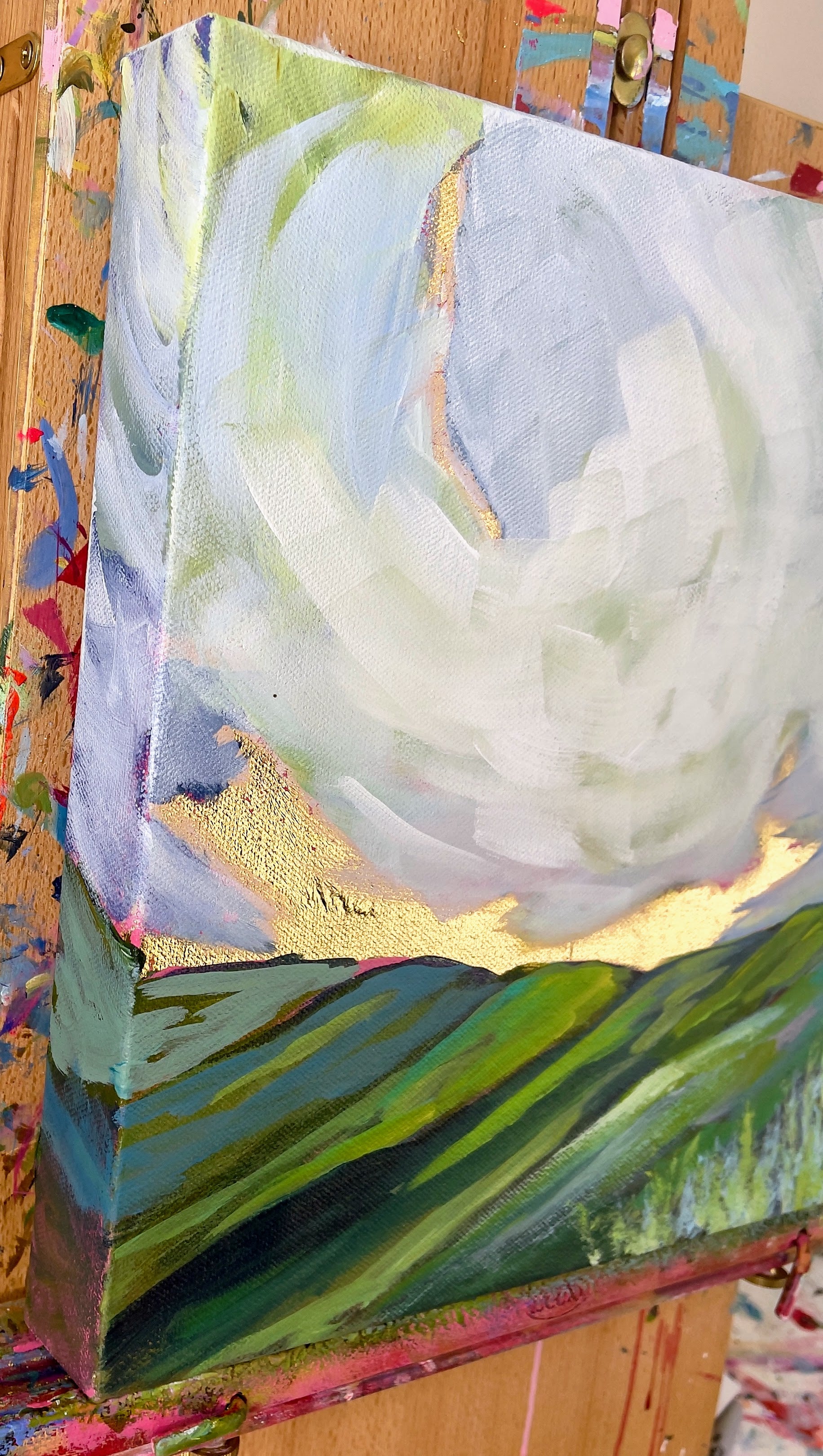 Colorful abstract painting on a wooden surface