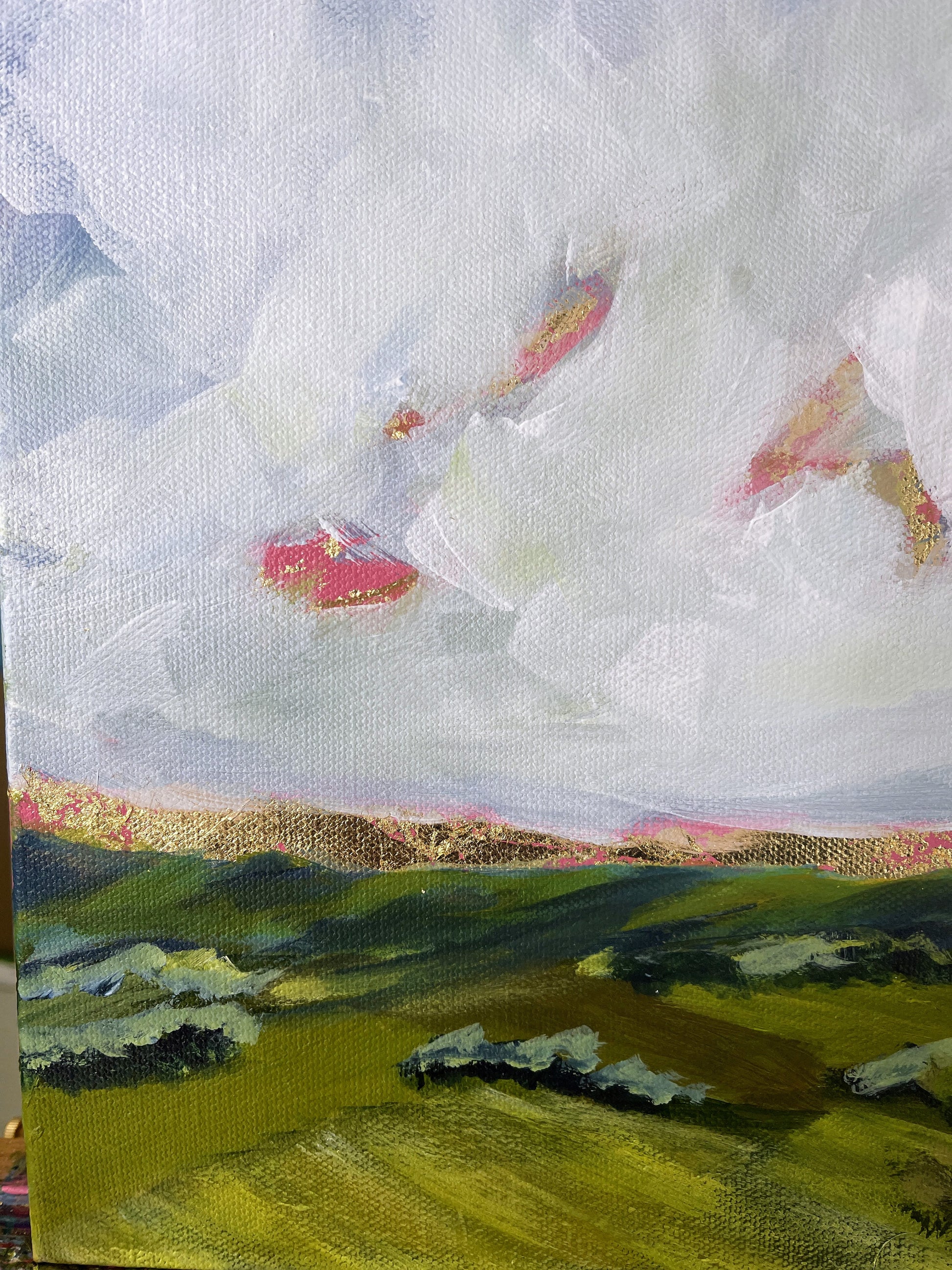 Painting of a landscape with green fields and white clouds